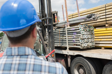 Buidling materials being unloaded from lorry