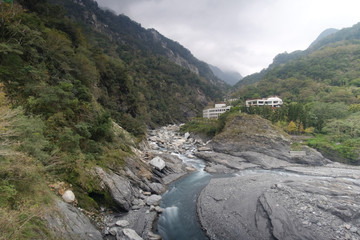 Fototapeta na wymiar River flows through the mountains.