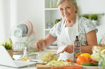 Grandmother cook in the kitchen