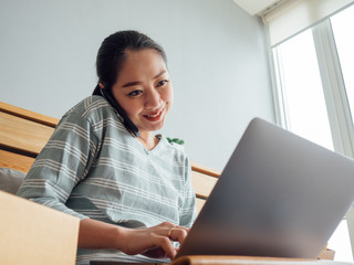 Happy woman online store owner receiving order from customer. Concept of online store digital business owner.