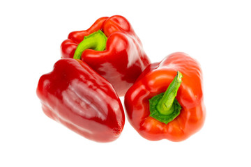 Three Red pepper. Closeup. Isolated on white background.Concept Health.