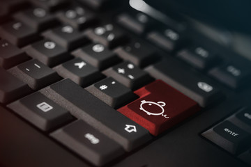 piggy bank for money on a keyboard with color red