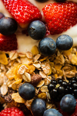Healthy breakfast concept with oat flakes and berries