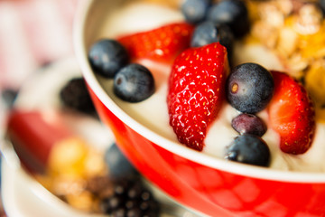 Healthy breakfast concept with oat flakes and berries