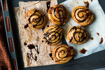 Chef Ready to Serve New York Steak with Shallot Onions and Vegetables at Restaurant Kitchen.