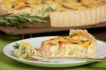 Home Baked Salmon Quiche With Broccoli. Traditional British Food.