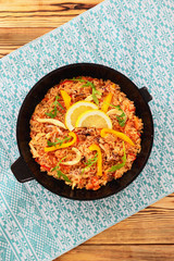 Seafood paella in a frying pan