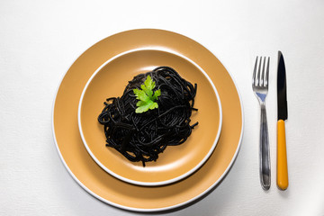 Spaghetti with squid ink. A browned squid with a little garlic and oil, then seasoned with the ink of the cuttlefish it self