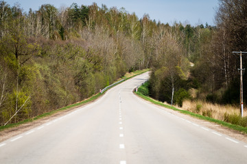 asphalt Road and the dramatic sky with strong perspective