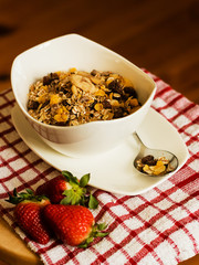 Healthy breakfast concept with oat flakes on tablecloth