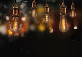 Vintage Edison light bulbs on dark background.