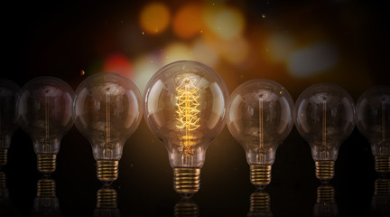 Vintage Edison light bulbs on dark background.