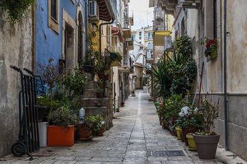 Street of the old town with houses of the historic village of Ragusa in Sicily, Italy