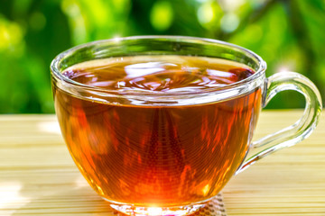 Black tea beautifully composed in the nature