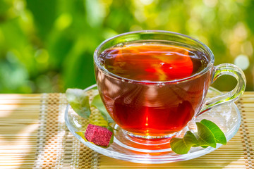 Black tea beautifully composed in the nature