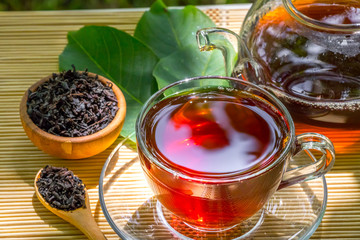 Black tea beautifully composed in the nature