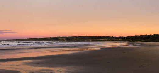 Fototapeta na wymiar sunset on the beach in Punta Del Diablo - Uruguay