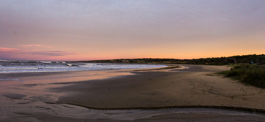 Fototapeta na wymiar sunset on the beach in Punta Del Diablo - Uruguay
