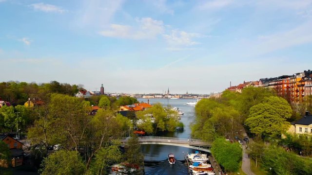 Aerial view of the canal "Langholmskanalen" in Stockholm and its boat club on a spring evening