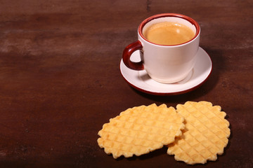 Wafel, caramel waffle and coffee cup, coffeebreak isolated on dark background