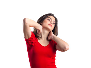 beautiful brunette teenager sport girl in red shirt is exercising, white background