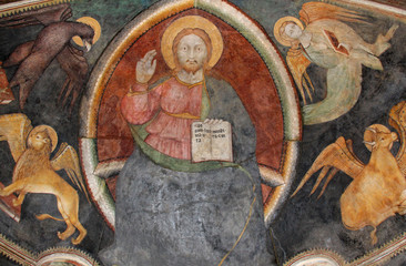 Obraz na płótnie Canvas Cristo luce del mondo con i smboli dei quattro evangelisti; affresco nell'Oratorio Visconteo di Albizzate