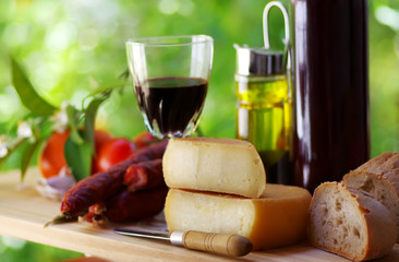 portuguese bread, cheese an red wine