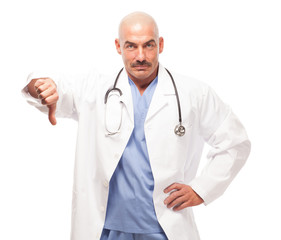 Doctor in scrubs and lab coat giving thumbs down.