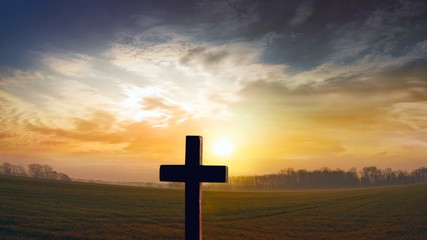 God's cross . Religion background . Paradise heaven . Light in sky . Cross against the sky . Happy Easter . Christian cross on sunset background . 