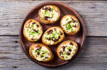 Baked potato stuffed with cheese