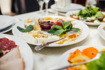 Beautifully decorated catering banquet table with different food