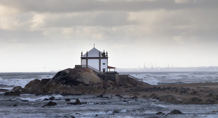 Fototapeta na wymiar Chapel on the Beach During a Stormy Day