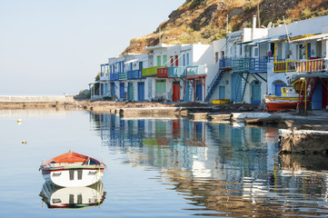Fototapeta na wymiar Colorful syrmata fishing houses of Klima village at Milos island in Greece