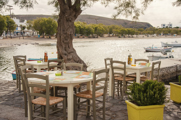 Traditional style taverna at the beach of Pollonia at Milos island in Greece