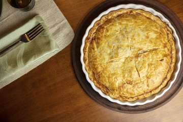 Golden crust Ham and Cheese Tart just baked and sitting on the counter ready to serve