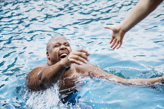 Man being rescued from the water