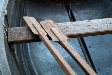 Paddles of fishing boats. Old fishing accessories in fishing boats.