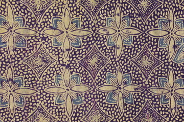 Gold purple batik texture and background 