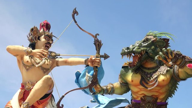 close up of an ogoh-ogoh archer statue at kuta beach in bali, indonesia