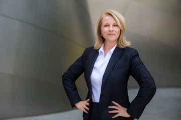 Confident proud successful business woman portrait, standing with confidence