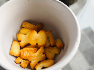 alphabet biscuits or cookies isolated in cup