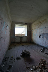 Totally marauded and vandalised residential building. 3 km. near Chernobyl area border. Kiev region. Ukraine
