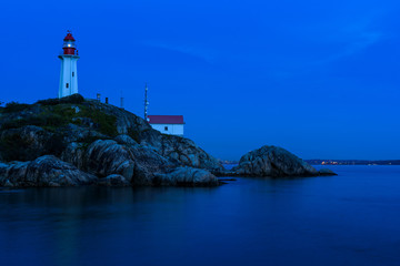 Fototapeta na wymiar Twilight at Point Atkinson Lighthouse, West Vancouver, Canada