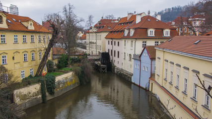 Fototapeta na wymiar Praha street houses, river canal