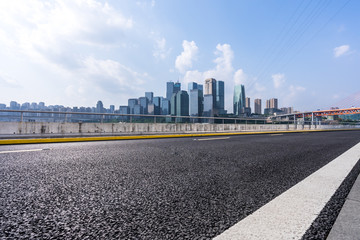 empty aspahalt road with modern building