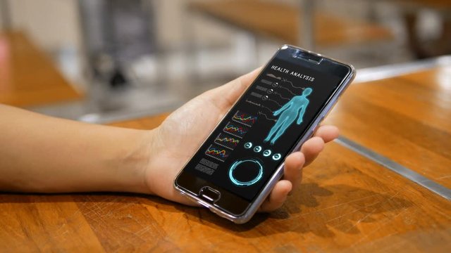 4K Hands of woman using using smartphone with HUD head up display user interface for mobile application technology concept

