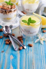 Yogurt with granola and grapefruit background