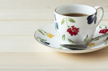 A cup of tea on wooden background