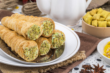 Sweet Bakery Food Puff Roll with Cream Also Know As Homemade Cream Roll, Puff Pastry, Swiss And Jelly Roll is a type of sponge cake roll filled with whipped cream, jam