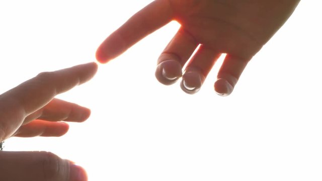 reaching helping hand with brightness, blessing, touch of god, angel